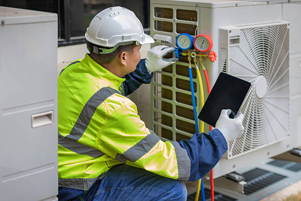Professional Hvac technician working in Franklinton, NC